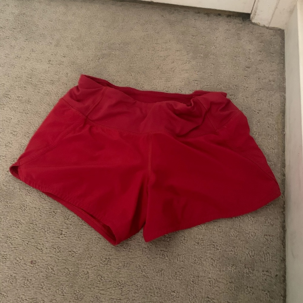 Red Lululemon shorts